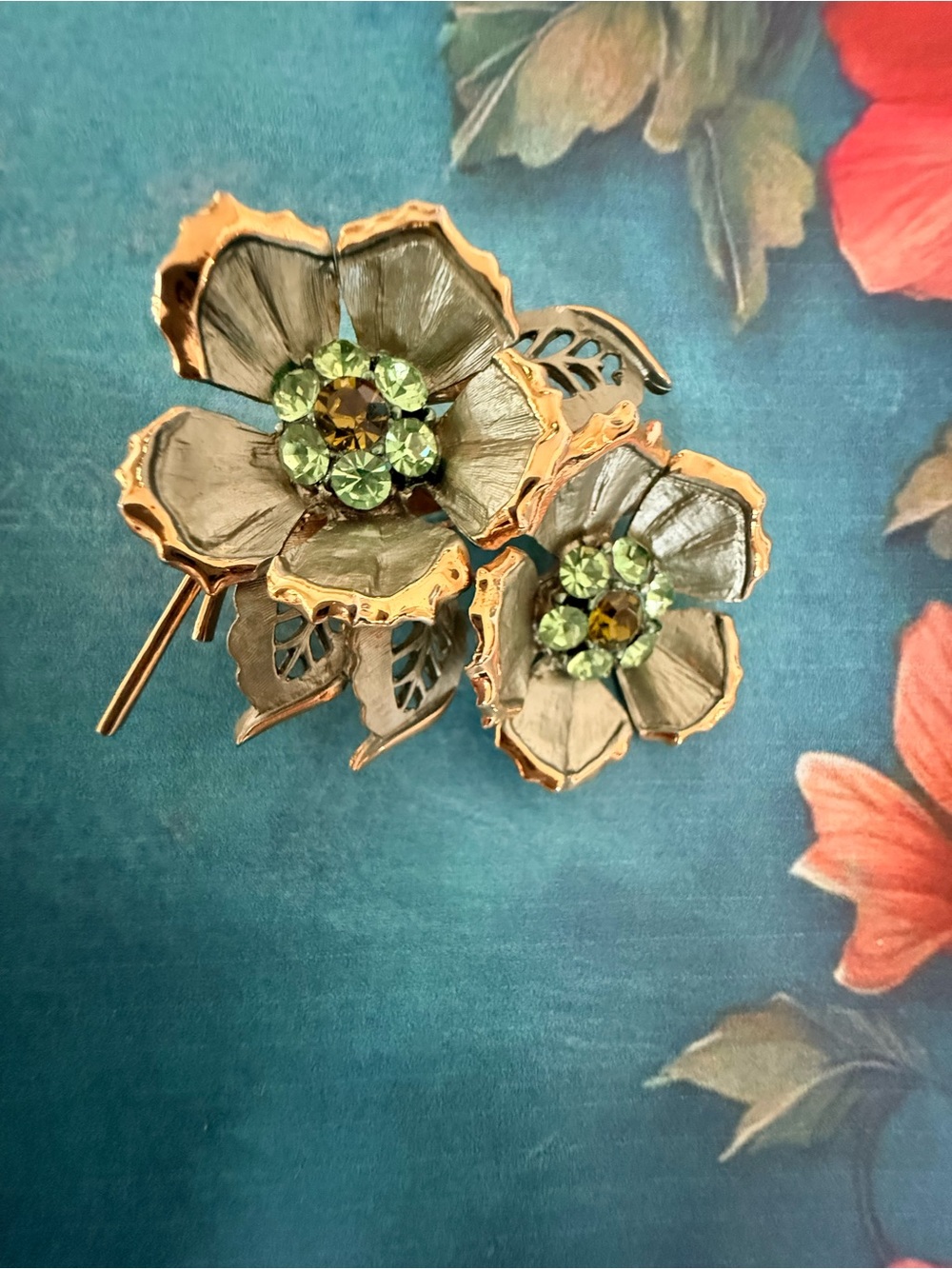 Gold-Tone Floral Brooch with Green Crystal Centers